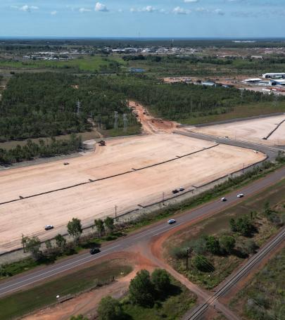 Aerial view of large serviced industrial lots at Wishart Estate prepared for development with road access and utilities